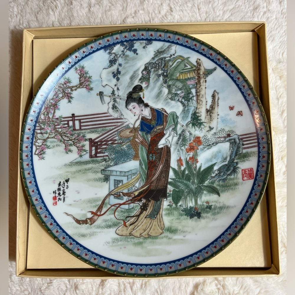 Tan-chun- porcelain plate collection by Master Zhao Huimin. Size 9x9x1 inches.